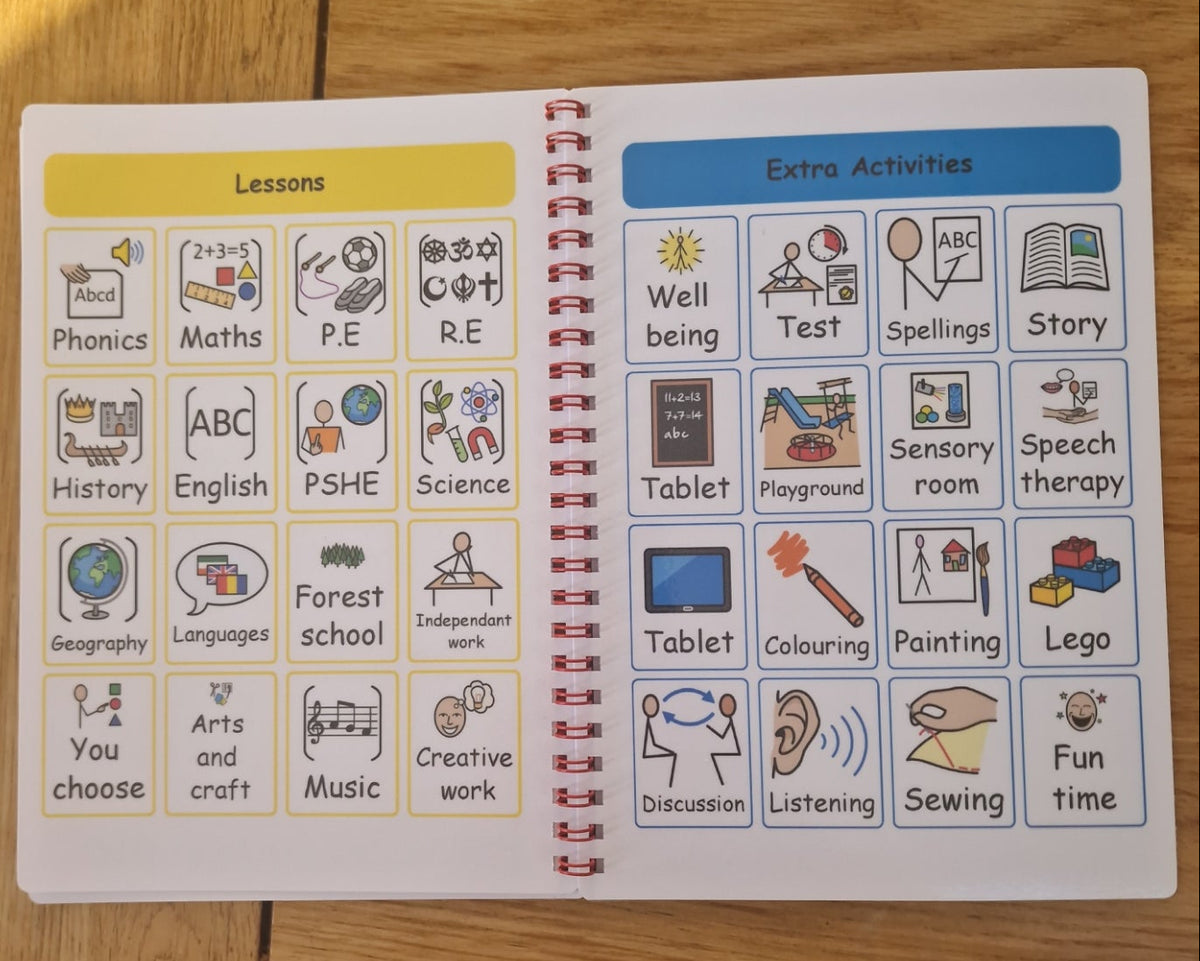 An open spiral-bound children's activity book laid flat on a wooden surface, showing two printed pages with colorful lesson and extra-activity tiles. The left page is headed 'Lessons' with subjects like Phonics, Maths, History, English, Science, Geography, and Languages.